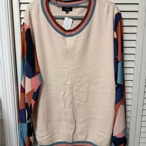 Fate Cream sweater top with Multicolor Geometric Sleeves